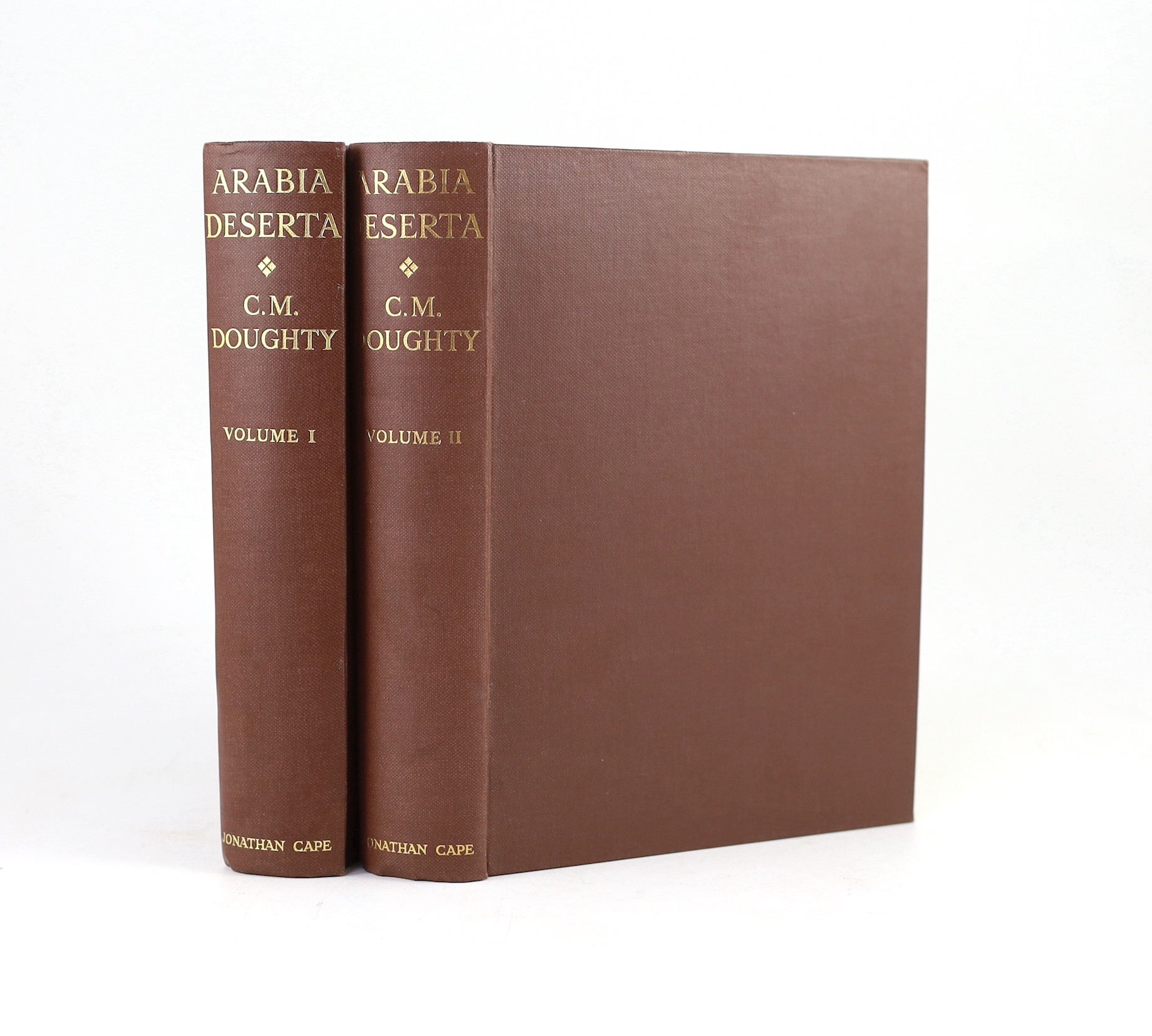 Doughty, Charles Montagu - Travels in Arabia Deserta, 2 vols, 4to, original cloth, with frontis portrait, 2 folding colour maps and 8 plates, Jonathan Cape, London, 1936